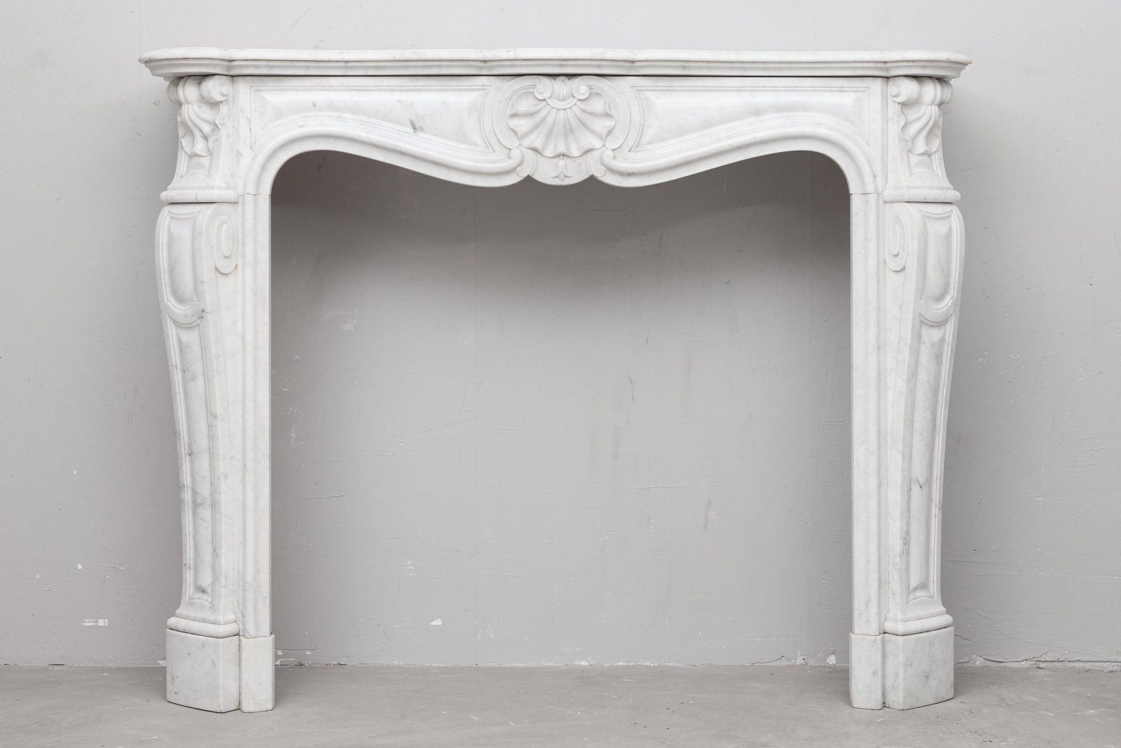 White marble, front fireplace, white carrara marble.