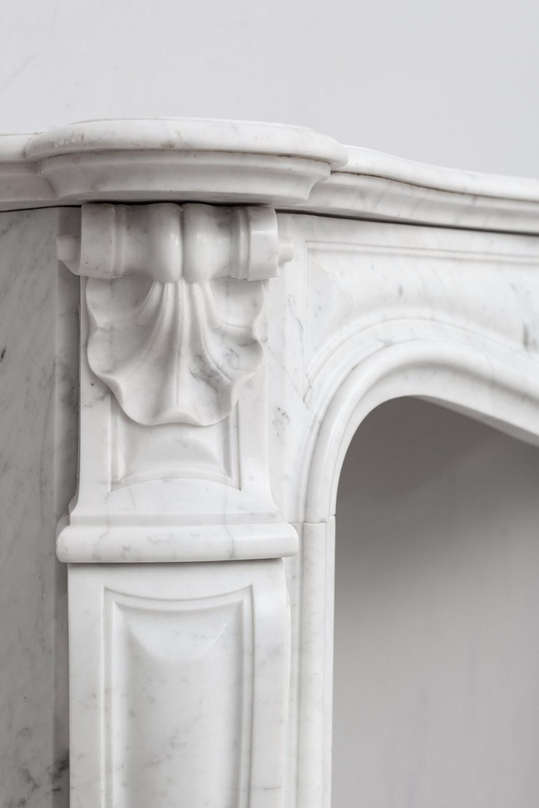 White marble, front fireplace, white carrara marble.