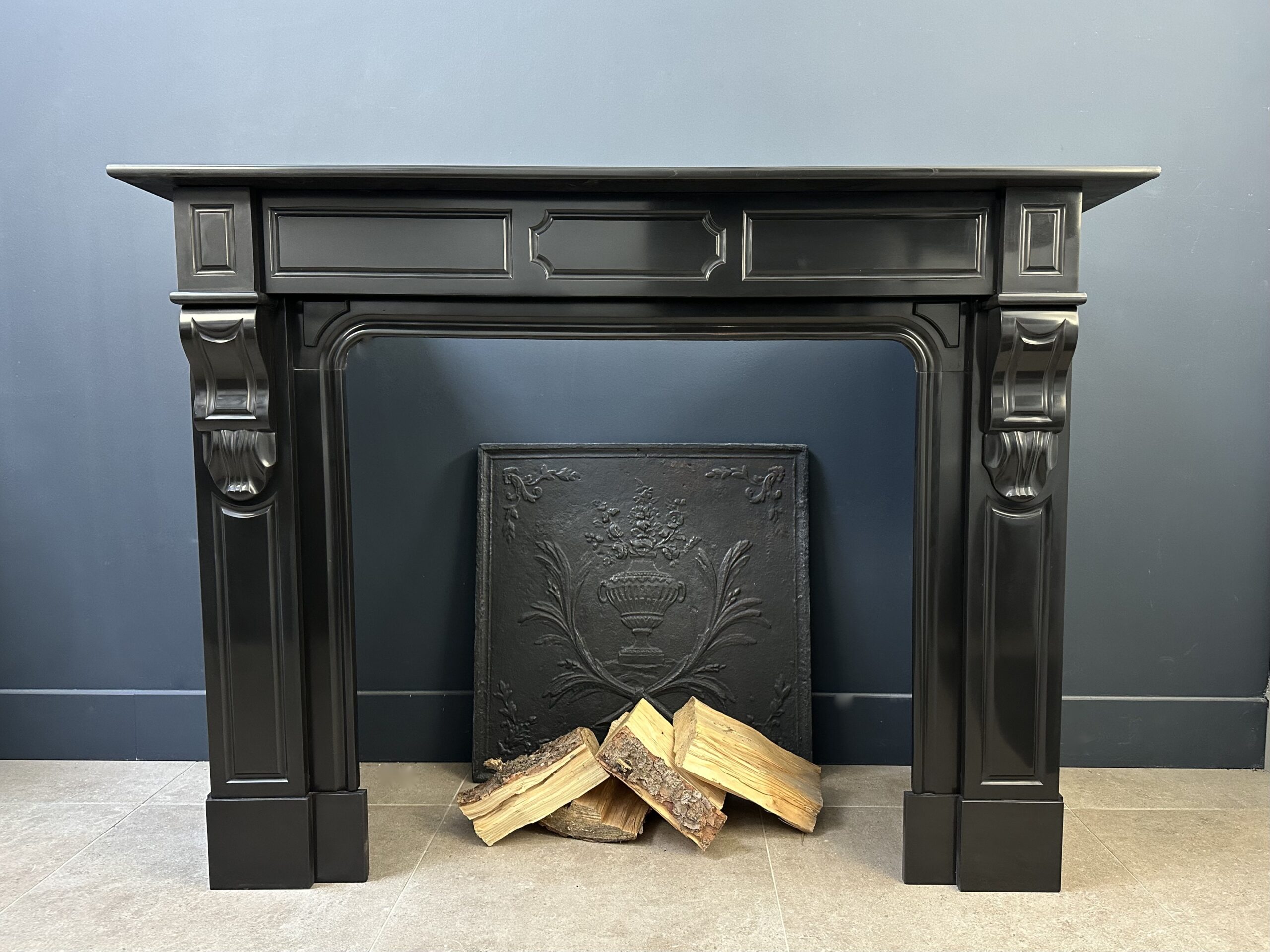 Antique orbiting fireplace black