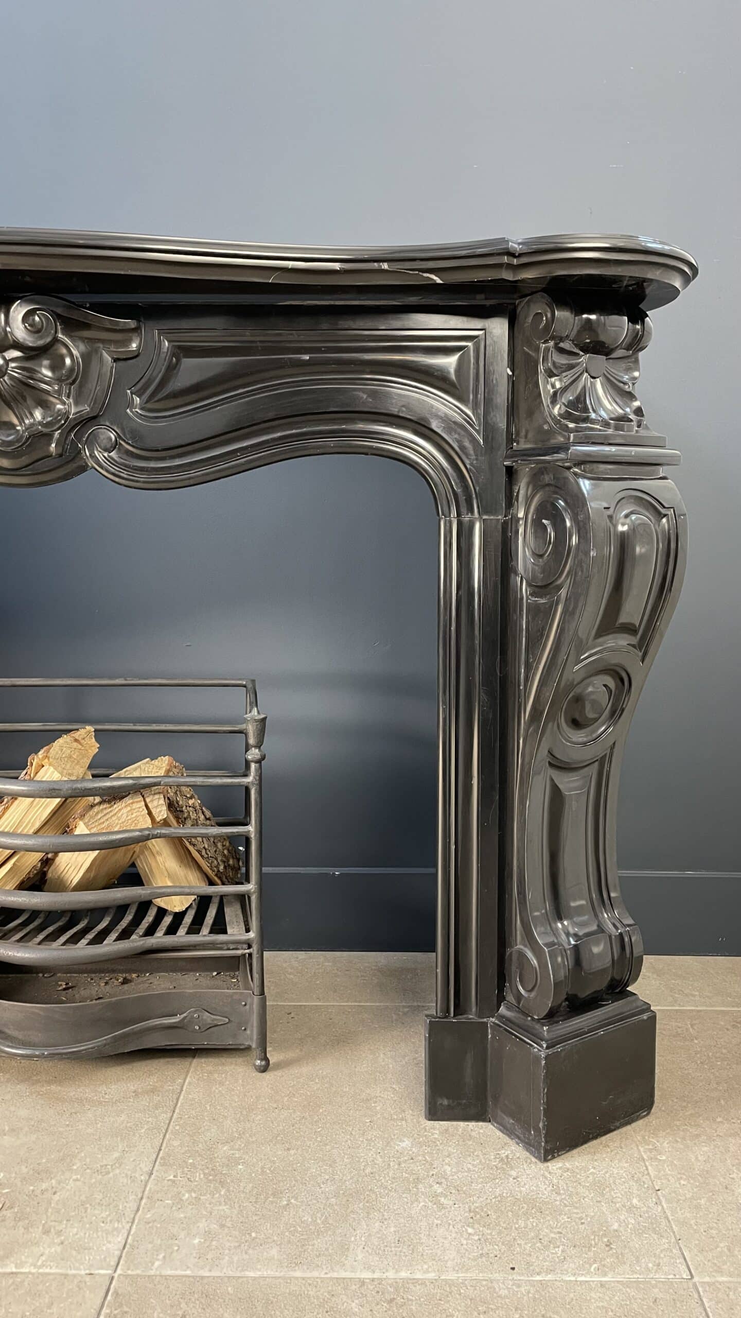 Black Marble Antique Shell Circular Fireplace 45 Degrees